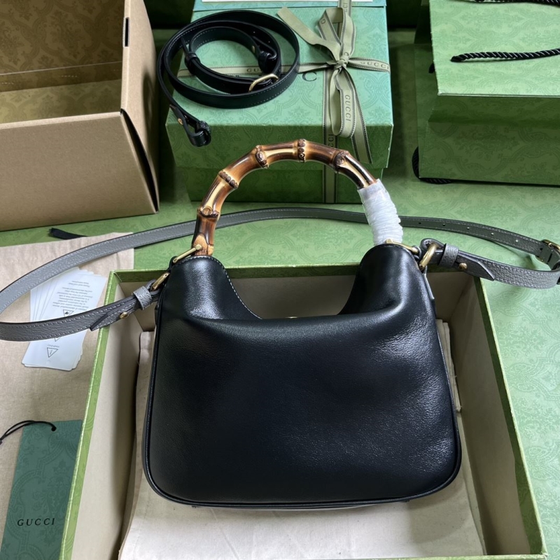 G*u*i top handle bags
